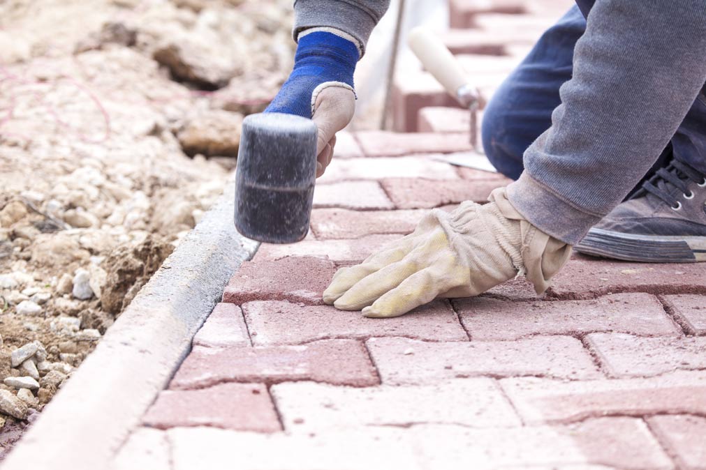 paver-repair-with-gloves-and-brick-100kb